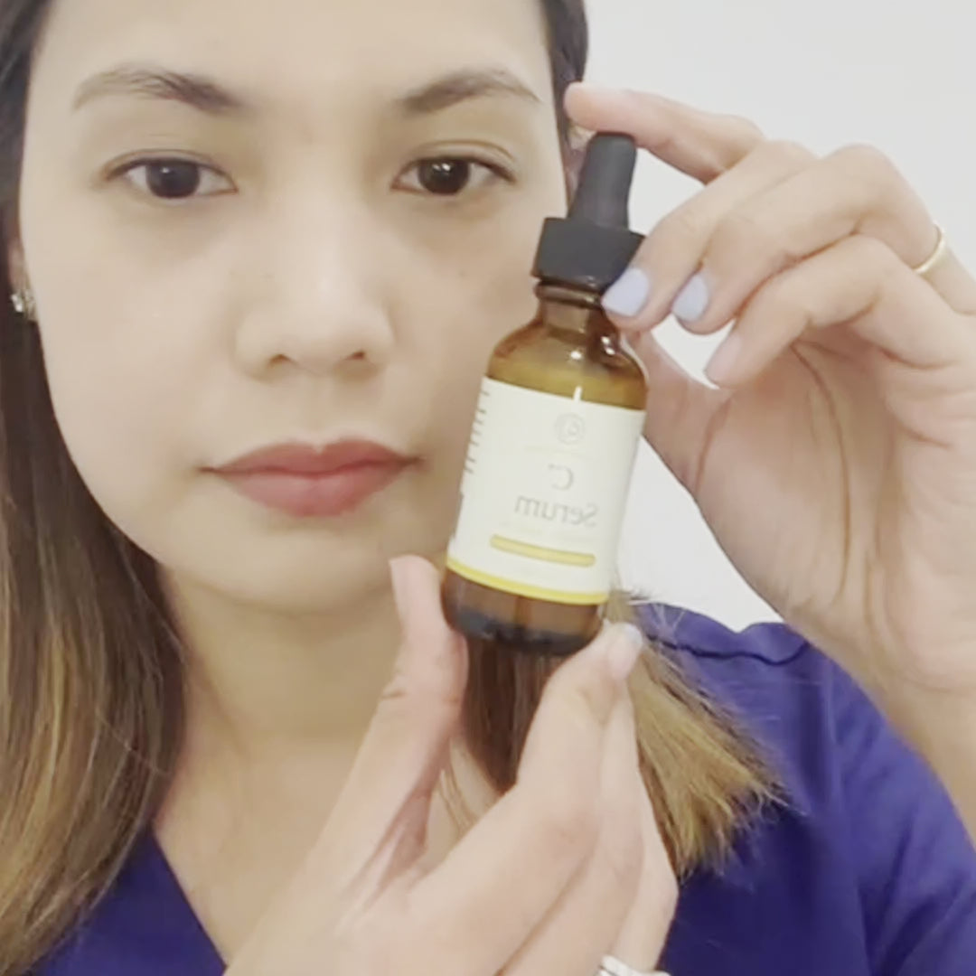 Maya Vu applying Vitamin C Serum from Mavian Beauty